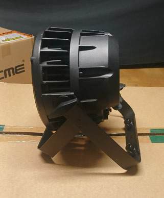 Side view of an Acme Sandane Frost fixture on its floor stand.