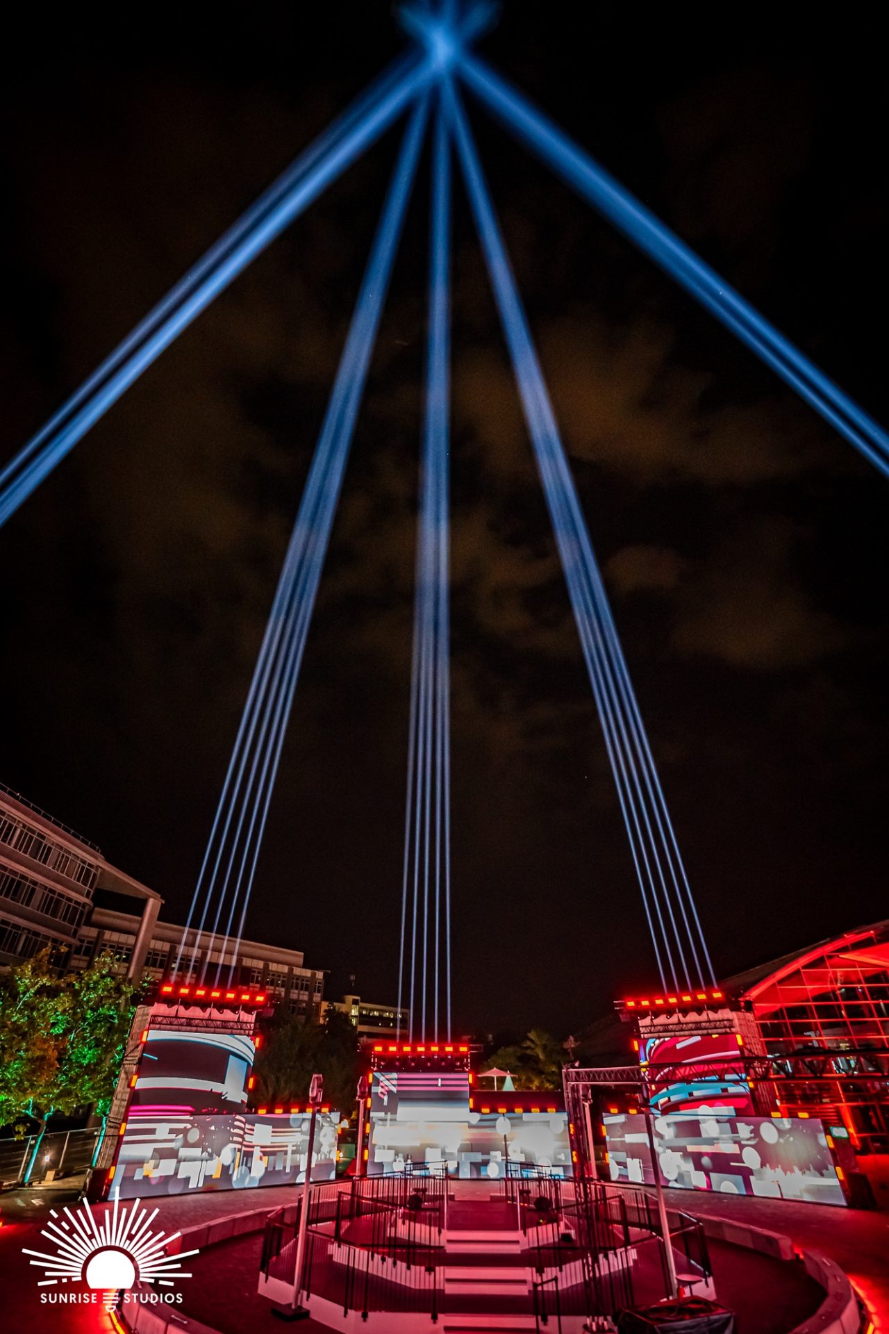 Blue beams converging high above the Audi Q3 launch venue.