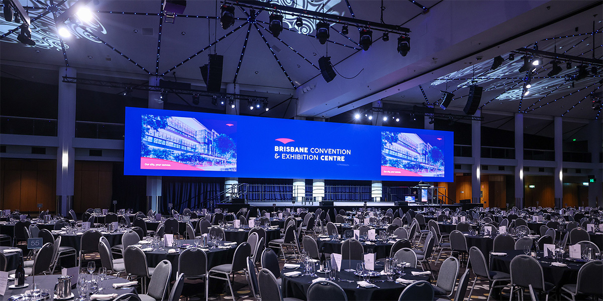 Side view of the panoramic LED canvas and banquet seating in BCEC's Plaza Ballroom.